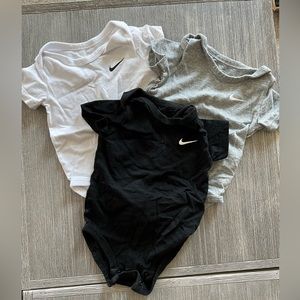 9 month Nike onsie bundle
